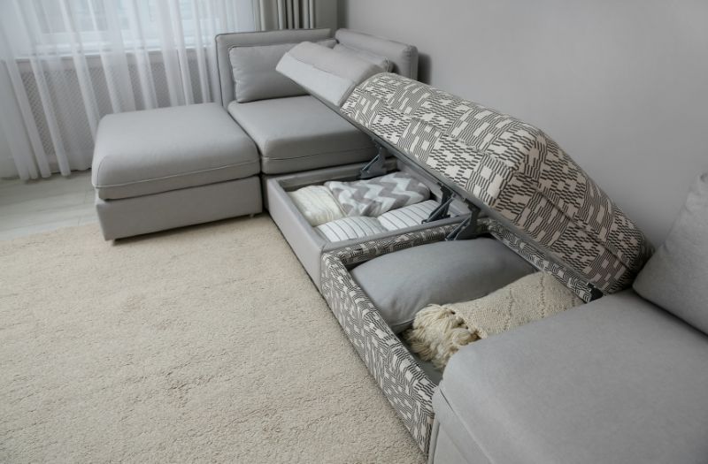 gray couch with a storage underneath