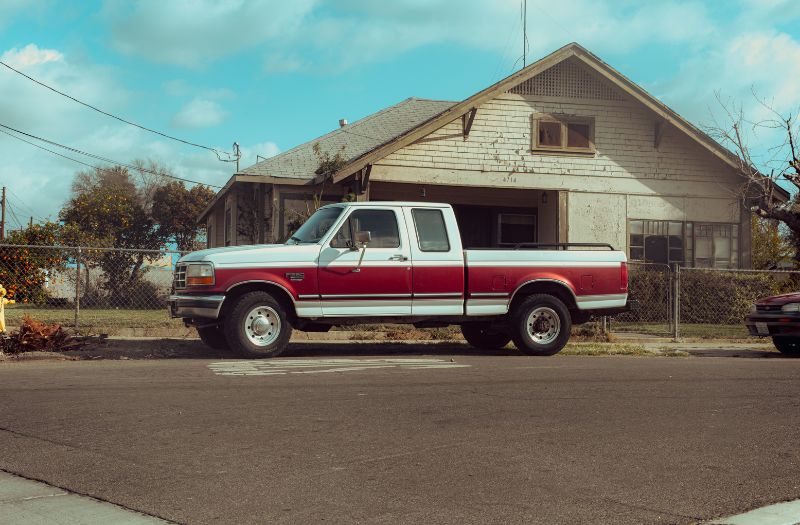 pickup truck parked outside the house