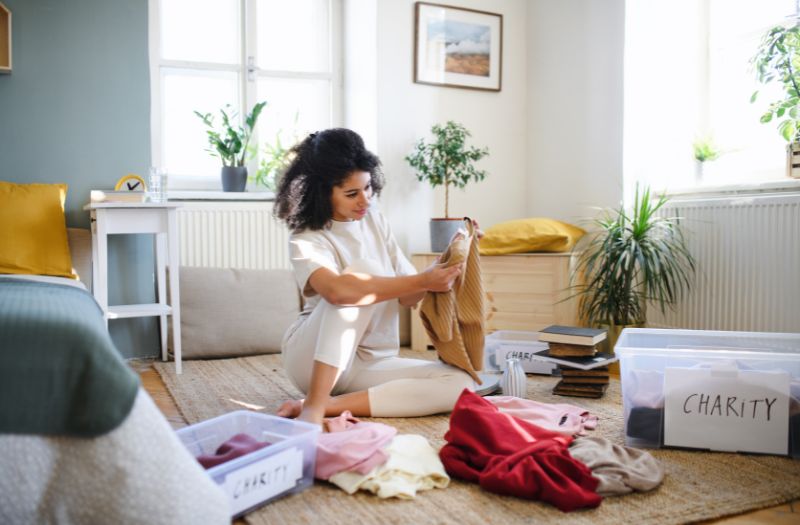 woman declutering her clothes