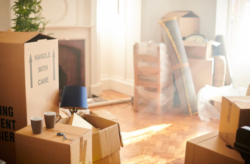 living room filled with boxes that are ready for moving out