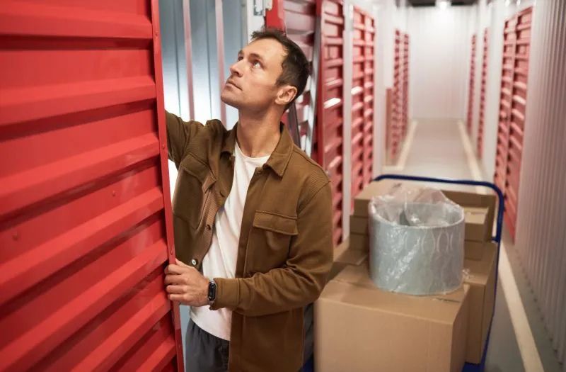 man checking his storage unit