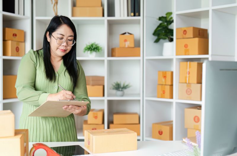 woman doing inventory for her small business